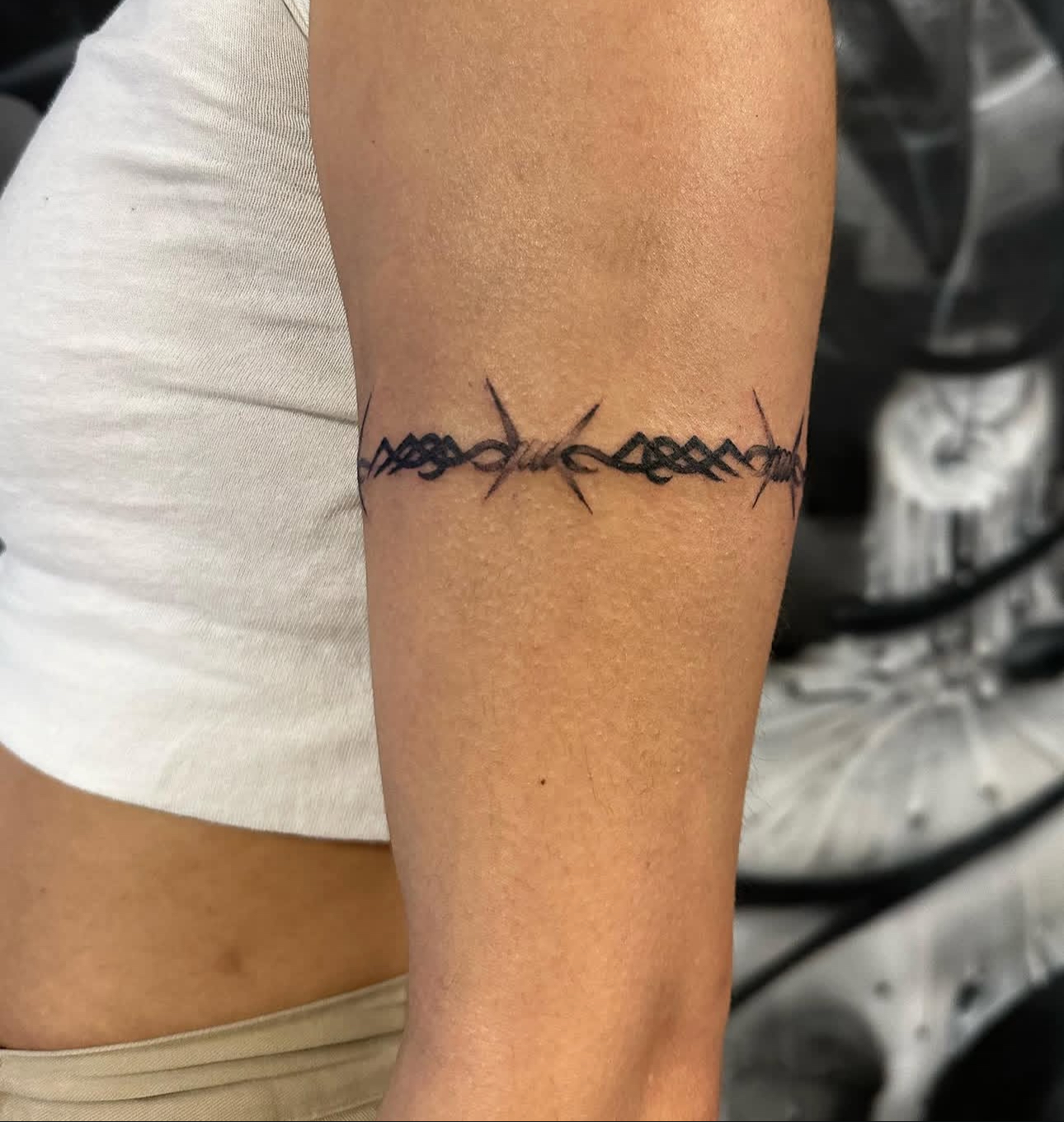 Barbed wire armband tattoo by Lauren