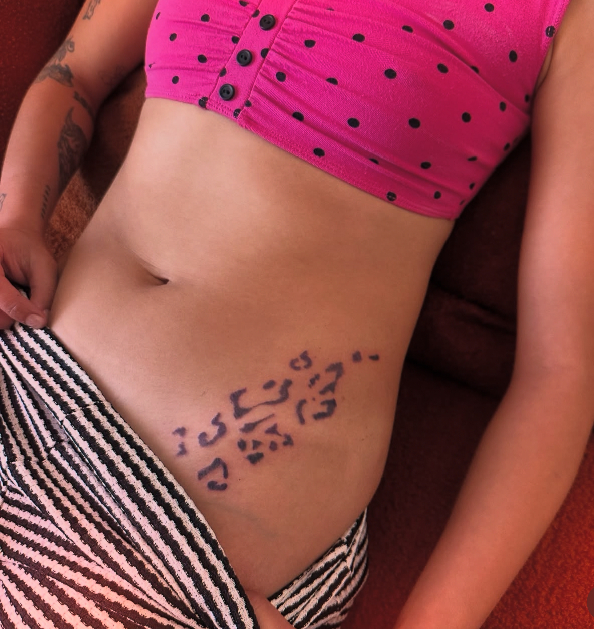 Arabic script tattoo by Lauren