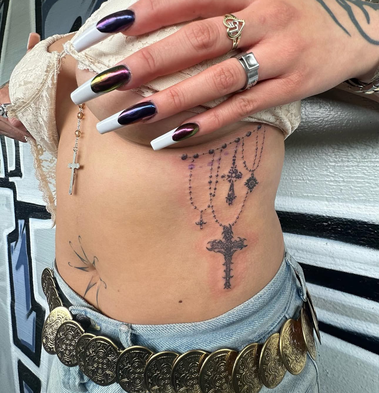 Fine line script name tattoo by Lauren