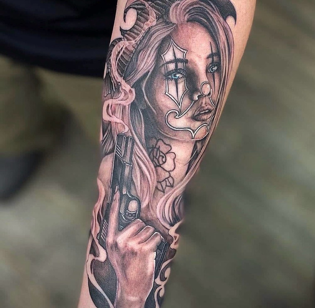 Black and grey portrait arm sleeve tattoo Austin TX